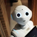 cute little white robot with big round eyes