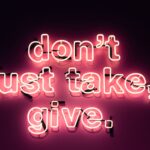 don't just take, give neon sign