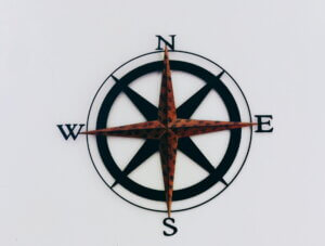 Black and red compass directions