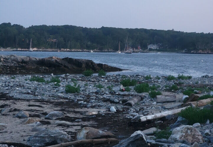 A rocky island beach shore on an island in Maine's Casco Bay