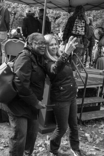 Shay Stewart-Bouley and gubernatorial candidate Hannah Pingree taking a selfie at a Maine event ahead of midterm elections in 2026